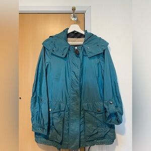 Authentic Burberry Brit "Maidleigh" parka in lightweight tech fabric.